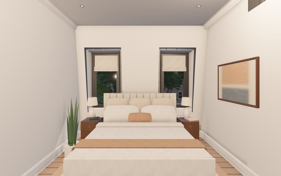 Third-floor primary bedroom with dormer windows